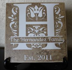 a plaque that says the hernandez family est 2011 is displayed on a table