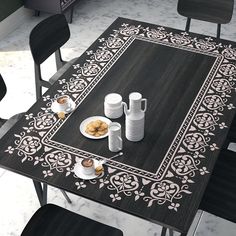 the table is decorated with black and white designs