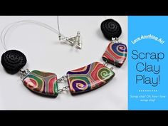 a colorful necklace with two black beads on it and the words scrap clay play written below