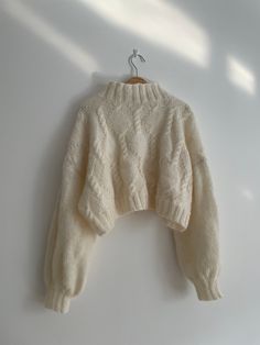 This is a knitted sweater by hand.Mohair sweaters will have a fuzzy feeling and very light. We can customize sizes, please tell me height and weight. Time:We will deliver the goods within 3 weeks after placing the order,and it will arrive in the US in 3-5 days. If you have any questions, please contact us and we will give you a satisfactory reply. Hand Knitted White Sweater One Size, White Hand Knitted Sweater One Size, Hand Knitted White One-size Sweater, White Hand Knitted One Size Sweater, Fitted Cozy Acrylic Sweater, Cozy Cream Knitted Cropped Sweater, Winter Mohair Sweater With Soft Knit, Fitted Chunky Knit Sweater In Winter White, One Size Cream Chunky Knit Sweater