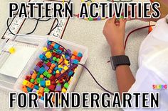 a child is playing with colorful beads in a box and on the table are letters that spell out pattern activities for kids