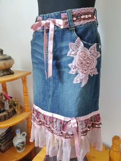 A unique stretch denim skirt in which you will feel comfortable and attract the eyes of others.Romantic boho skirt with ruffles and varios lace,tulle, crystals.satin ribbons аnd handmade textile flower with beads.The skirt closes with zipper.                                                                                                              Size:M Waist:80,Hips:100,Lenght:60цm/23inches Bohemian Long Denim Skirt, Bohemian Summer Denim Skirt, Bohemian Denim Skirt For Summer, Summer Bohemian Denim Skirt, Fitted Bohemian Cotton Denim Skirt, Bohemian Cotton Denim Skirt For Festival, Bohemian Patchwork Denim Skirt For Summer, Handmade Fitted Bohemian Skirt, Bohemian Denim Skirt For Festival