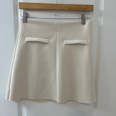 Zara Suede Skirt In Off White/Light Beige. Never Worn, Perfect Condition. Size Small. A Line Zara Flared Mini Skirt With Lining, Zara Lined Flared Mini Skirt, Zara Flared Mini Skirt, Cream Stretch Mini Skirt, Zara Relaxed Mini Skirt With Lining, White Pleated Zara Skirt, Elegant Flowy Mini Skirt By Zara, Zara Stretch Lined Skort, Zara Stretch Skort