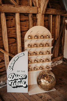 Disco ball wedding with gold disco cups drink station and favours for guests Backdrop With Shelves, Arched Shelves, Wedding Warehouse, Disco Ball Wedding, Disco Ball Wall, Drinks Station, Disco Ball Cup, Brides Cake, Ball Wedding