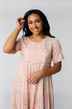 Lovely floral embroidered dress Lightweight woven Round neckline Short sleeves with embroidery Multiple gathered tiers Side pockets Lined Fabric content - Rayon - Hand wash recommended Spring Dress With Embroidered Hem, Spring Embroidered Cotton Dress, Cheap Cotton Embroidered Dress With Short Sleeves, Cheap Casual Embroidered Dress, Cheap Casual Cotton Embroidered Dress, Casual Dresses With Embroidered Hem, Grandma Dress, Knit Fabric Dress, Dusky Skin