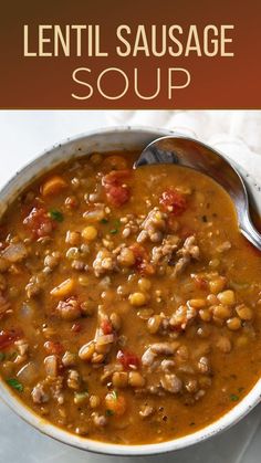 lentil sausage soup in a white bowl with a spoon on the side and text overlay that reads lentil sausage soup