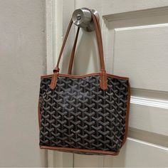 This Is An Authentic Goyard Mini Anjou Bag Bought Directly In The Paris Boutique. It Comes With The Original Yellow Dustbag. Condition Is Near Perfect With No Scuffs, Stains Or Flaws. Please Feel Free To Ask More Questions! Poshmark Will Authenticate This Bag For Free, So Please Be Assured. Happy To Sell On Other Platforms If You Are More Comfortable. Located In Dmv Area For Those Who Want To View Before Purchasing. Goyard Mini Anjou, Paris Boutique, Brown Color, Mini Bag, To Sell, Dust Bag, Bag Lady, Things To Come, Feel Free