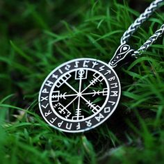 Find your way with this Viking jewelry necklace featuring the ancient Vegvisir. As a Norse symbol of guidance, this runic compass pendant provided protection for brave explorers. The meaningful Vegvisir design will inspire you to stay on course towards your goals and remain true to your inner compass. Expertly engraved onto a rounded silver charm, it hangs from an adjustable leather cord. Handcrafted with care by our artisans, each sustainable necklace is unique. Whether you have Scandinavian ro Handmade Viking Style Jewelry For Outdoor, Amulet Style Compass Pendant Necklace, Spiritual Compass Pendant Jewelry, Spiritual Compass Pendant Necklace, Black Viking Jewelry For Outdoor, Black Viking Style Jewelry For Outdoor, Black Viking Style Outdoor Jewelry, Handmade Spiritual Necklaces For Outdoor, Outdoor Engraved Medallion Necklace