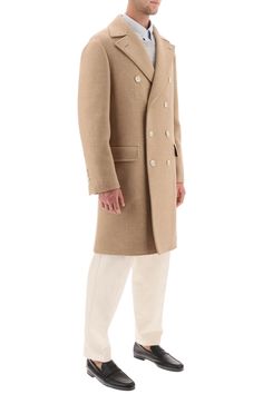 Brunello Cucinelli coat crafted in wool and cashmere. Double-breasted design with eight-button closure featuring peak lapel, front jetted pockets with flap, four-button cuffs and back center vent. Partially lined interior with two pockets and a pen holder. Regular fit with deconstructed shoulders. The model is 187 cm tall and wears size IT 48. Size Info IT Color Detail Beige Made In Italy Material 95% WO 5% WS Season One fall Season Two winter Product clothing Brand Brunello Cucinelli Size And F Peak Lapel, Cape Coat, A Pen, Double Breasted Coat, Cool Socks, Pant Shirt, Pen Holder, Brunello Cucinelli, Winter Wardrobe