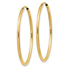 Elevate your everyday look with these stunning 14k Yellow Gold Polished Endless Hoops. Crafted with high-quality yellow gold, these hoops feature a sleek and polished finish for a timeless appeal. The hollow body and hidden wires make these earrings effortless to wear while maintaining a refined and elegant look.Measuring 1.5mm thick and 30mm wide, these hoops are the perfect size for adding a touch of sophistication to any outfit. Whether you're heading to the office or out for a night on the t Medium Hoop Earrings, Hoop Earrings Style, Bow Jewelry, Earring Sale, Gold Polish, Fine Jewelry Gift, Online Earrings, Fine Jewellery Earrings, Selling Jewelry