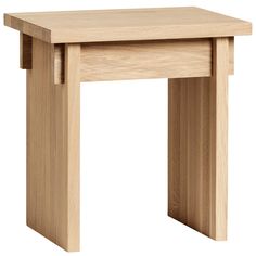 a small wooden table with two legs on the top and one leg raised up to it's side