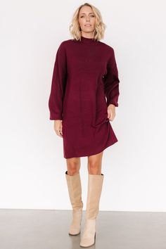 Get a sophisticated look! Deep mulberry color Knit material with plenty of stretch Mock neckline Long bubble sleeves Chic straight silhouette Short length Perfect for dressing up or down 52% Viscose, 28% Polyester, 20% Nylon Trina is 5'6, cup size 32D, size 2 and is wearing size S