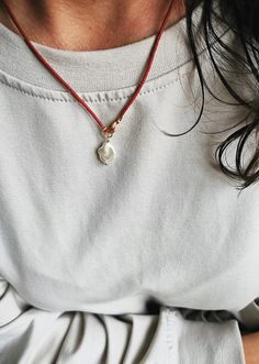 Red beaded necklace with a unique pearl pendant. The pendant is made of small, high-quality Miyuki beads. The beads are very tiny about 1.5mm in size.  A modern and minimalist necklace suitable for wearing alone or goes well with other necklaces. Pearl size ~ 1x1,5cm Necklace will come in a gift box with brand logo and contact card inside the package. It is ready to be given as a gift or somewhere handy for you to keep it safe. The item will be shipped with a registered priority post. If you have any questions please contact me. ---------- Red pearl necklace, Minimalist red beaded choker, Simple red beaded necklace, Red pearl pendant, Miyuki beaded necklace, Modern red necklace Cheap Red Beaded Necklaces As Gift, Affordable Red Beaded Necklaces For Gifts, Affordable Red Beaded Pendant Necklaces, Cheap Red Beaded Necklaces For Gifts, Cheap Casual Red Beaded Necklace, Luxury Minimalist Handmade Necklace, Little Red Necklace, Adjustable Red Pearl Necklace, Adjustable Red Pearl Necklace Gift