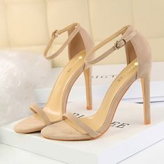 Trendy Closed Toe Sandals With 4-inch Heel, Party Heels With Single Toe Strap In Suede, Chic Heels With Single Toe Strap, Party Suede Heels With Single Toe Strap, Suede Heels With Single Toe Strap For Parties, Trendy High Heel Suede Sandals, Trendy Suede Sandals For Evening, Suede Open Toe Heels With Branded Insole, Trendy Suede High Heel Sandals