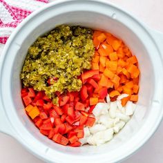 chopped vegetables in a white bowl on a table