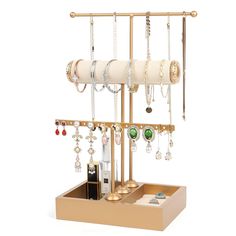 a jewelry holder with several necklaces and earrings