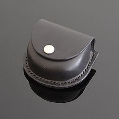 "Genuine leather pouch suitable for earphones, earbuds, hearing aid sets, coins, etc. The pouch is available with an optional belt loop or belt clip. If you are looking for a leather case for your AirPod or AirPod Pro, please visit this page: https://bit.ly/exodos_airpodscases ♦️ MAKING Handcrafted from 7oz / 2.7mm Italian premium natural vegetable-tanned cowhide. The leather is wetted, pressed, and formed around a wooden pattern to get the perfect shape, dried, hand-dyed, and finally hand-stitc Earbud Holder, Wired Earphones, Earphones Holder, Leather Craft Projects, Small Belt, Wooden Pattern, Cord Ties, Airpod Pro, Hand Stitch