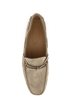 Gommino loafers by TOD'S made of soft hand-stitched suede leather, with laces on the front and embossed logo on tongue. Leather lining and iconic pebbled sole. Loafers With Laces, Versace Bags, Birkin 25, Balenciaga Designer, Soft Hands, Lv Bag, Soft Hand, Embossed Logo, Fendi Bags