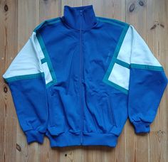 89-96 production year Adidas track top. Pleasant and soft materials,2 zipped side pockets. made in Hungary. Great condition.Measurements;back-68cm,sleeve from beck-77cm,width pit to pit-68cm.Size M. Retro Sports Track Jacket With Pockets, Adidas Blue Functional Outerwear, Adidas Track Top, Retro Blue Cotton Track Jacket, Vintage Adidas Jacket, Blue Adidas Long Sleeve Track Jacket, Air Force Jacket, Adidas Fleece Long-sleeve Outerwear, Vintage Blue Adidas Jacket