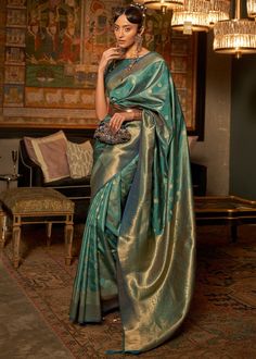 This soft Zari Based Handloom woven Silk Saree is smooth with engraved designs to enhance the overall appeal of the saree. Rich incredible details with beautiful colour, this is a beauty to behold. --------------------------------- S A R E E ● D E T A I L S --------------------------------- ● Fall and Edging : Done ● Tassel : See in Option ● Petticoat : On request Extra Charges ● Drapping Saree (Ready to wear) : On Request Extra Charges ● Blouse : Matching Unstitched Piece (See in option) ● Occasion : Wedding, Party, Festive, Function ● Type: Bollywood ● Includes : 1 Saree, 1 Blouse Piece ● Saree length : 5.5 meter ● Blouse piece : 0.8 meter ● Wash Instruction:- Dry Clean Only Premium quality Product with Fine Finishing 🎁      Gift for Women This lovely Weaving Silk Saree makes for a fant Saree For Wedding Party, Drapping Saree, Saree For Wedding, Teal Green Color, Handloom Weaving, Half Sleeve Blouse, Green Saree, Blue Saree, Art Silk Sarees