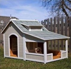 a small dog house with a little dog in it