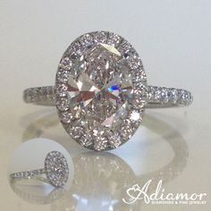 an oval cut diamond ring with pave set shoulders