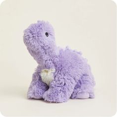 Warmies® Plush are fully microwavable to provide hours of soothing warmth and comfort. Purple Long Neck Dinosaur Warmies is scented with real dried French lavender and perfectly weighted for a positive sensory experience. Warmies make an ideal gift for all ages. Quick Facts: Simply Warm Purple Long Neck Dinosaur Warmies in a Microwave Soothes, Warms and Comforts Scented with Real French Lavender Chill in a Freezer for Cooling Relief Safe for all Ages Dimensions: 9”x8”x14” Weight: 2lbs Brady Core, Long Neck Dinosaur, Warm Purple, Dinosaur Plush, Yellow Labrador, Chocolate Labrador