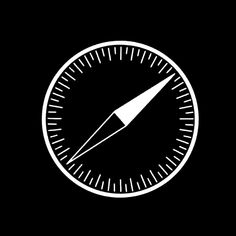 a black and white compass icon on a dark background