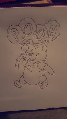 a drawing of winnie the pooh holding balloons