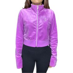 A Sparkling Logo Design Marks The Chest Of This Cropped Front-Zip Jacket Textured In Sumptuous Knit Velvet. 17" Length Stand Collar Long Sleeves 95% Polyester, 5% Spandex Size: M Color: Lollipop Purple Stretch Outerwear For Fall, Fitted Long Sleeve Track Jacket For Fall, Trendy Fitted Track Jacket For Fall, Fitted Casual Track Jacket With Zipper Closure, Fitted Casual Track Jacket With Zipper, Fitted Long Sleeve Track Jacket For Winter, Winter Casual Fitted Track Jacket, Purple Long Sleeve Stretch Outerwear, Casual Fitted Winter Track Jacket