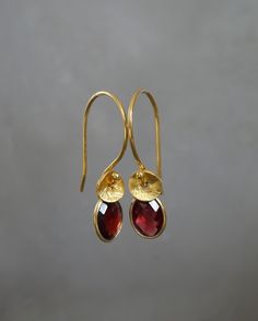 "These beautiful 24k gold vermeil earrings feature a genuine faceted garnet and twisted textured bead. Vermeil is a thick coat of 24 karat gold on solid sterling silver. Garnet is the birthstone for January. These earrings would make a perfect gift for any occasion. Total length: 2.7 cm (1\") Width: 7 mm The earrings will come in a beautiful gift box. * CHECK OUT MORE JEWELLERY * www.etsy.com/shop/kailajewellery" Thick Coat, 24 Karat Gold, Birthstone Earrings, Heart Dangle Earrings, Ruby Necklace, January Birthstone, Garnet Earrings, Ruby Earrings, Birthstone Earring