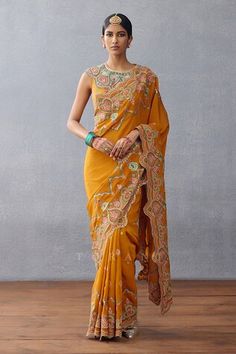 Yellow floral print padded blouse with sequin and resham embroidery in slub silk base. - Aza Fashions Festival Floral Embroidery Pre-draped Saree, Transitional Floral Embroidered Pre-draped Saree, Floral Embroidered Pre-draped Art Silk Saree, Fitted Pre-draped Saree With Floral Embroidery For Festivals, Yellow Chikankari Embroidered Fitted Pre-draped Saree, Yellow Fitted Pre-draped Saree With Chikankari Embroidery, Fitted Yellow Pre-draped Saree With Chikankari Embroidery, Yellow Chinon Pre-draped Saree, Chinon Blouse Piece For Reception