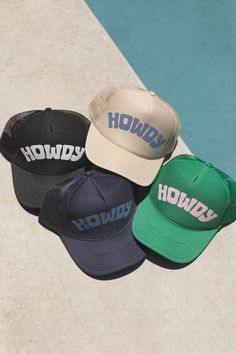 Classic Howdy trucker hat. Screen printed "Howdy" art on the front foam panel. High crown fit with adjustable snapback closure.

Features
- Puff "Howdy" Screenprint
- Adjustable Fit
- High Crown Mesh Trucker

Content + Care
- 100% Polyester Front; 100% Polyester Mesh Back
- Spot clean
- Domestic Trendy Trucker Hat With Letter Print And Flat Brim, Trendy Flat Brim Trucker Hat With Letter Print, Trendy Letter Print Flat Brim Trucker Hat, Trendy 5-panel Trucker Hat With Letter Print, Trendy Adjustable Trucker Hat With Graphic Print, Trendy Snapback Trucker Hat With Graphic Print, Trendy Graphic Print Snapback Trucker Hat, Trucker Hat Black, Foam Panels