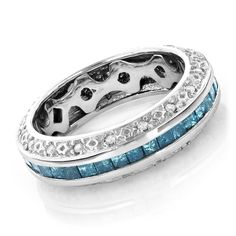 a blue and white diamond ring with two rows of diamonds on the inside of it