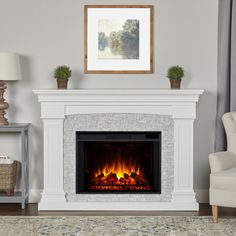 a living room with a fire place in the center and a chair next to it