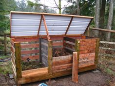 an outdoor garden shed with plants growing in it