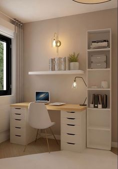 a computer desk with a laptop on it in front of a window and bookshelf