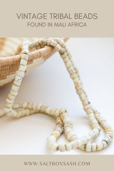 Beautifully aged, very old strand of white beads found in Mali Africa, called 'Green Heart' beads, made sometime between 1400 and 1800s in Murano, Venice. #homedecor #fairtrade #decorbeads #vintage White Artisan Necklace With Wooden Beads, Artisan White Necklace With Wooden Beads, White Jewelry With Oval Wooden Beads, Traditional White Necklace For Healing, Bohemian White Necklaces With Oval Beads, Bohemian White Necklace With Oval Beads, Bohemian White Oval Beaded Necklaces, White Bohemian Necklace With Oval Beads, Traditional Heart Beads For Jewelry Making