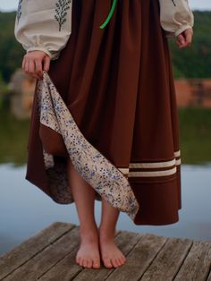 Embrace timeless elegance with our handcrafted skirt, featuring a rich brown fabric with a delicate floral lining that adds a touch of softness. Paired with intricate embroidery on the sleeves, this piece captures the essence of nature and tradition. Perfect for those who appreciate vintage-inspired, artisanal fashion. 🌿 Enter your waist size and height when ordering and we will sew it perfectly for you! Fantasy Sewing, Artisanal Fashion, Skirt Embroidery, Embroidery Skirt, Artisan Fashion, Ribbon Skirts, Brown Skirt, Brown Skirts, Intricate Embroidery