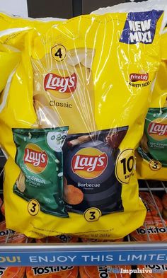 bags of lay's potato chips are on the shelf