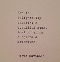 an old typewriter with the words she is delightful chaotic a beautiful mess loving her is a splendid adventure