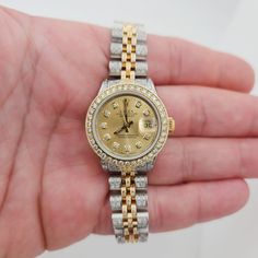 Women's Rolex 26mm DateJust 18K Yellow Gold / Stainless Steel Watch with Diamond Band, Diamond Dial and Diamond Bezel. Pre-Owned SN# 834**** Brand: Rolex. Crystal: Plastic. Gender: Ladies. Dial: Diamond Dial. Bezel: Diamond Bezel. Dial Color: Champaign. Movement: Self-Winding. Case Dimensions: 26mm. Bracelet: Diamond Bracelet. Service Date: Fully Serviced on 03/30/2023. Metal Type: 18K Yellow Gold / Stainless Steel. Bracelet / Strap: 18K Gold / Stainless Steel / Diamond.. Box / Certificate: Role Rolex 26mm, Rolex Watches Women, Diamond Box, Rolex Women, New Rolex, Bracelet Diamond, Bezel Diamond, Diamond Band, Watch Movement