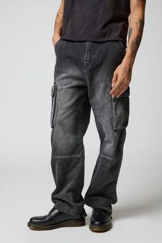 Light wash cargo pocket jeans by the essential BDG label. Features a baggy fit and high rise waist. Topped with utility pockets and includes a zip fly & button closure. Urban Outfitters exclusive. Features Baggy fit jeans from BDG High-rise waist 14oz. denim Zip fly; button closure UO exclusive Content + Care 100% Cotton Machine wash Imported Size + Fit Model is wearing size 32 Measurements taken from size 32 Rise: 13" Inseam: 32" Leg opening: 10" | BDG Baggy Skate Fit Cargo Jean in Black, Men's at Urban Outfitters Utility Cargo Jeans In Washed Black With Hip Pockets, Baggy Straight Leg Cargo Jeans Techwear, Baggy Straight Leg Cargo Jeans In Techwear Style, High Rise Washed Black Cargo Pants For Streetwear, Baggy Cargo Style Washed Black Jeans, Urban Washed Black Cargo Jeans With Five Pockets, Urban Style Washed Black Cargo Pants With Pockets, High-rise Washed Black Cargo Jeans, Urban Washed Black Cargo Pants With Pockets