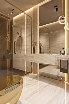 an elegant bathroom with marble floors and gold fixtures on the walls, along with a glass enclosed shower stall