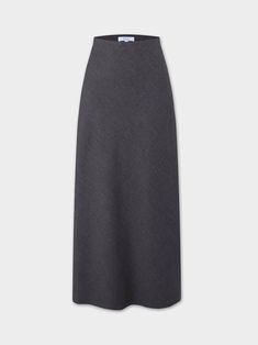 This Wool Blend Slip Skirt - Grey provides warmth and comfort all day long. The skirt's versatile design and classic color make it a perfect addition to any wardrobe. Stay stylish and cozy with this slip skirt. **Although we try our best to ensure none of our products contain shatnez, please be sure to check any product that contains wool or linen before wearing. Long Grey Skirt, Long Wool Skirt, Grey Skirt, Slip Skirt, Wool Skirt, Wool Skirts, Gray Skirt, Make It, Wool Blend