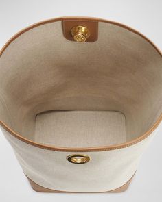 Altuzarra bucket bag in leather and canvas cotton    Shoulder strap, 15" drop    Open top with pushlock closure     Approx. 14"H x 8.3"W x 9"D    Made in Spain Canvas Bucket Bag, Leather And Canvas, North South, Open Top, Bucket Bag, Neiman Marcus, Tops Designs, Shoulder Strap, Spain