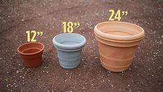 three clay pots sitting on top of dirt next to each other with measurements for them