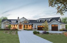 this is an artist's rendering of a house in the country style with two garages