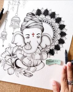 a drawing of an elephant with flowers on it's head and the face of ganesh