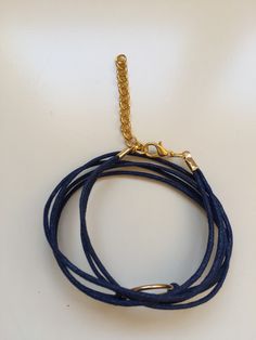 "BUY TWO GET A THIRD FOR FREE!! (please, don't add your free product to your shopping cart or you will be charged for it. Pick 1 product and leave the full name of it in the \"Note to enjoywelrydesign\" Box during checkout.)This is a waxed cotton Karma bracelet with a metal ring charm. What goes around, comes around. Wear your bracelet as a reminder, to keep the circle positive, peaceful and loving. The bracelet is adjustable and fits wrists from 51/2'' to 81/2\" (14cm to 22cm). Finishing, alloy Resizable Gold Wrap Bracelet As Gift, Adjustable Gold Spiritual Wrap Bracelet, Adjustable Gold Minimalist Wrap Bracelet, Gold Friendship Bracelets With Adjustable Band, Trendy Metal Wrap Bracelet As Gift, Casual Gold Waxed Cord Jewelry, Adjustable Bangle Wrap Bracelet Gift, Adjustable Wrap Bracelet For Gift, Trendy Gold Wrap Bracelet For Friendship